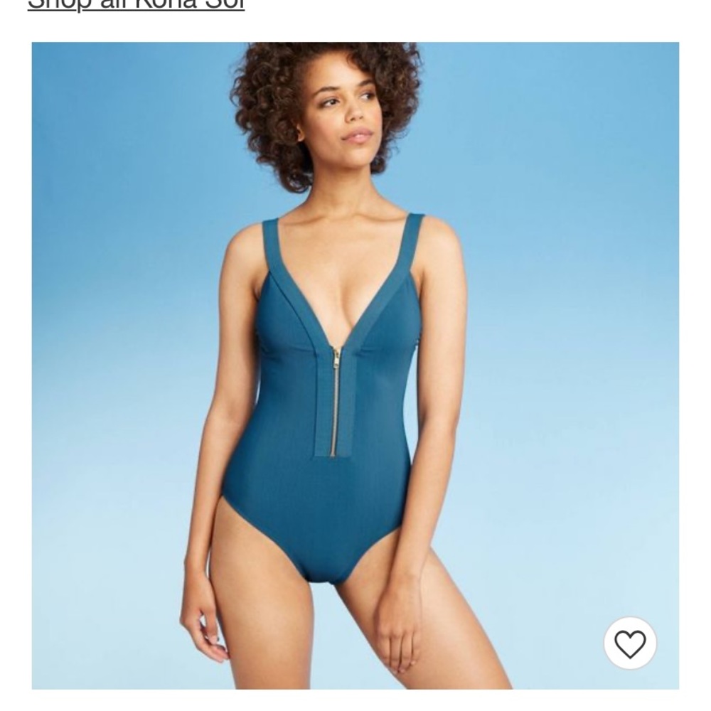 Swimsuit with gold zipper